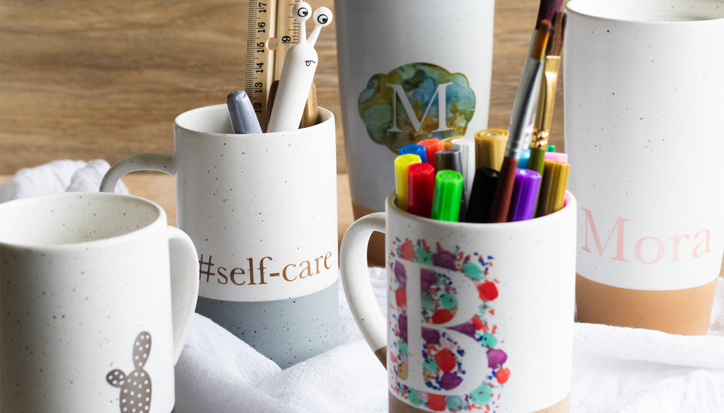 12oz mora ceramics tea mugs with paint, alcohol ink, and cricut machine personalization